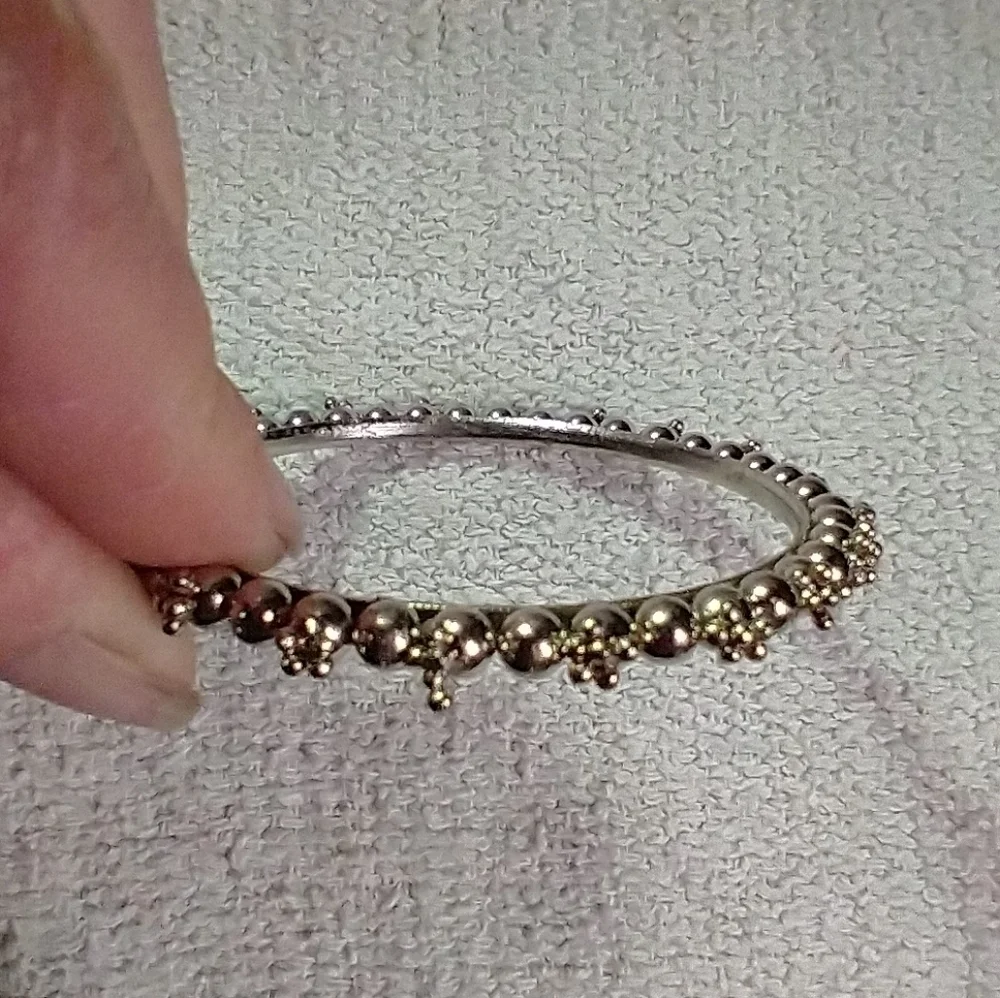 Silvertone decorative bangle bracelet
